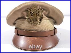 U. S. WWII Army tan service cap for officers. Some month holes, loose visor, size